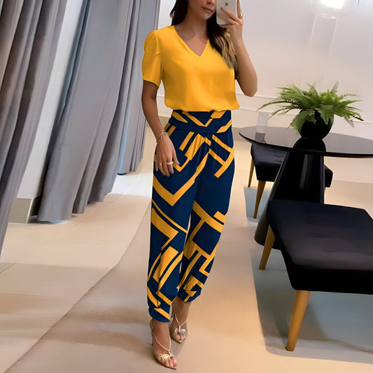 https://cdn.shopify.com/s/files/1/0706/7110/6290/files/alexandra-trendy-set-met-blouse-en-broek-265122_2105a345-1c91-4bda-a7c5-3b43bddd2f43.jpg?v=1722435659