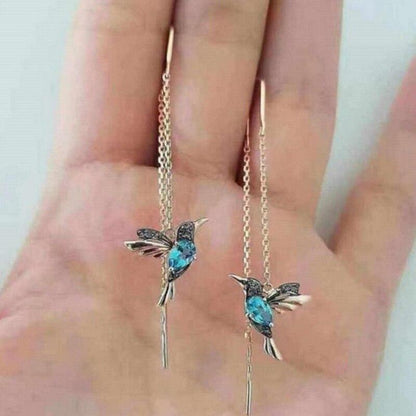 https://cdn.shopify.com/s/files/1/0827/1891/6940/files/kfH7cf02f9f065f4a0b8828cc5d8af0c6f2YPendientes-minimalistas-con-cadena-de-Color-plateado-para-mujer-aretes-largos-con-borlas-llamativos-con-personalidad_9425e5e8-2d16-4f9d-82cd-38c654.jpg?v=1738616913